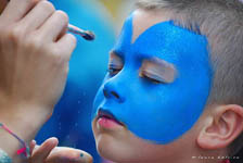 child with blue face