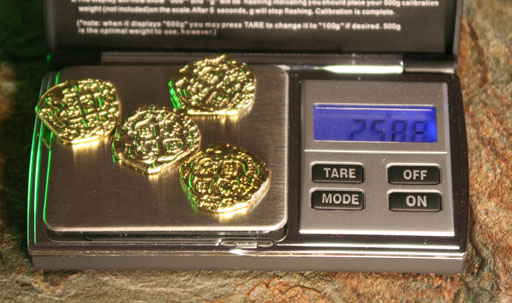 spanish coins being weighed