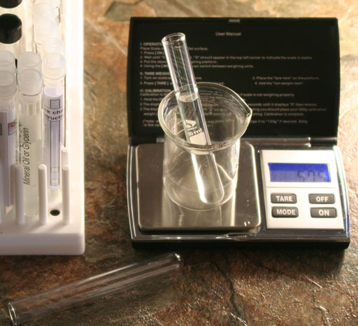 weight test tube with water in it