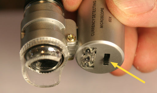 microscope's light switch