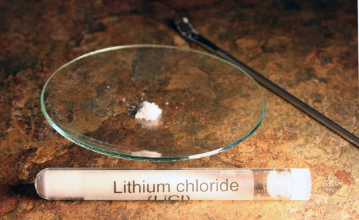 Lithium chloride powder on watch glass